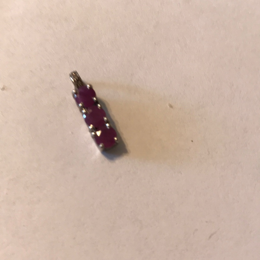 Three stone ruby pendant